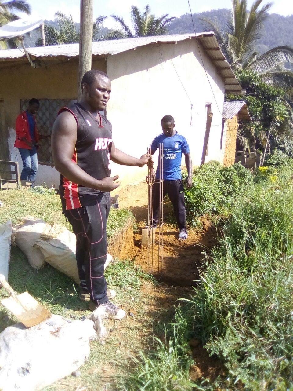 Community members digging the pipeline
