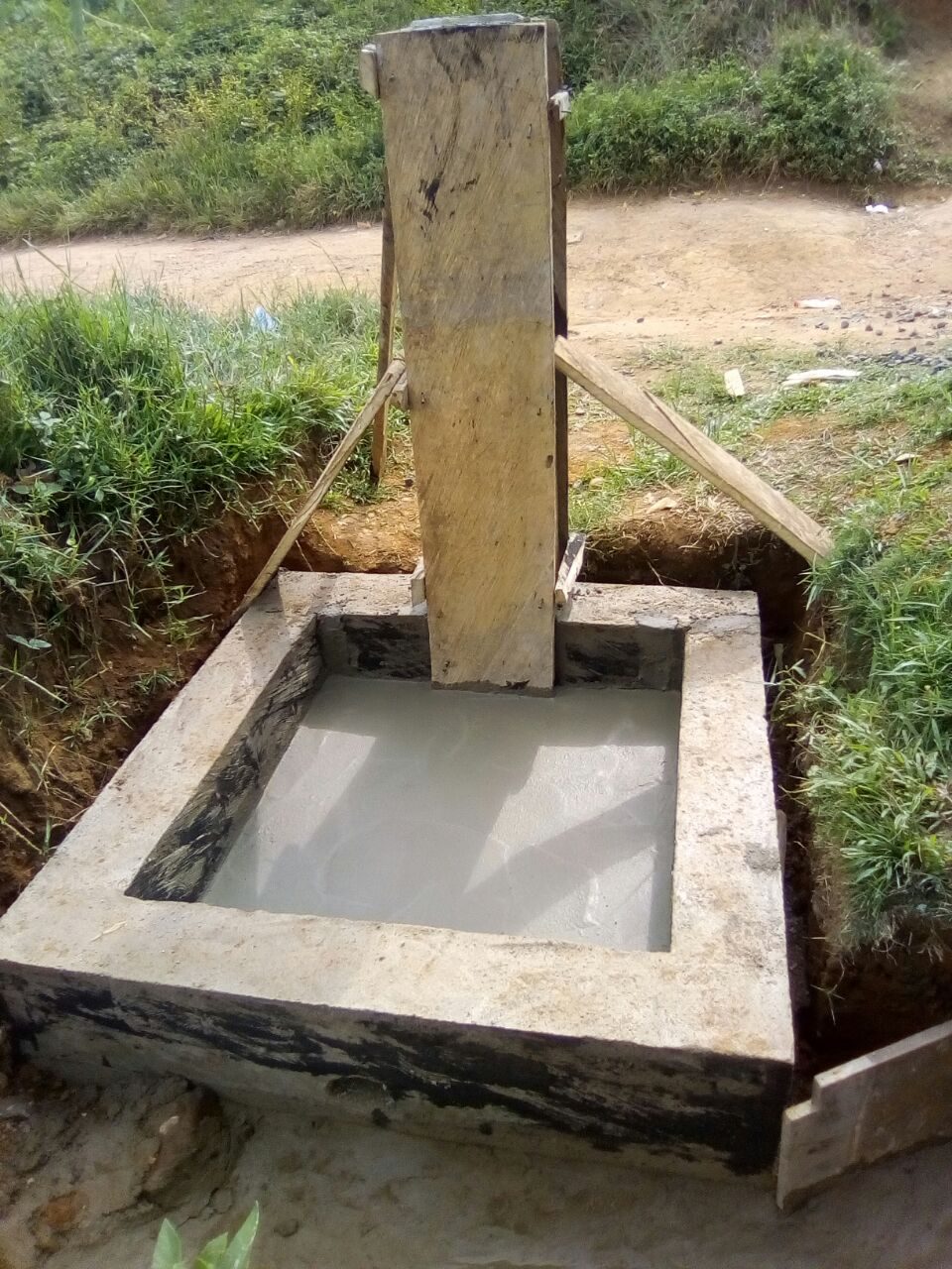 One of the two new public tap stands under construction